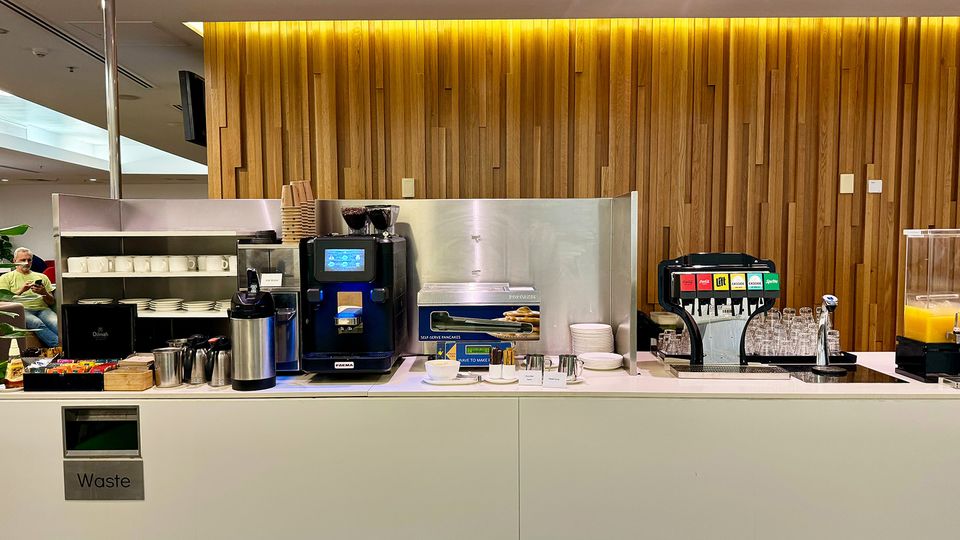 Self-serve drinks and a pancake machine.