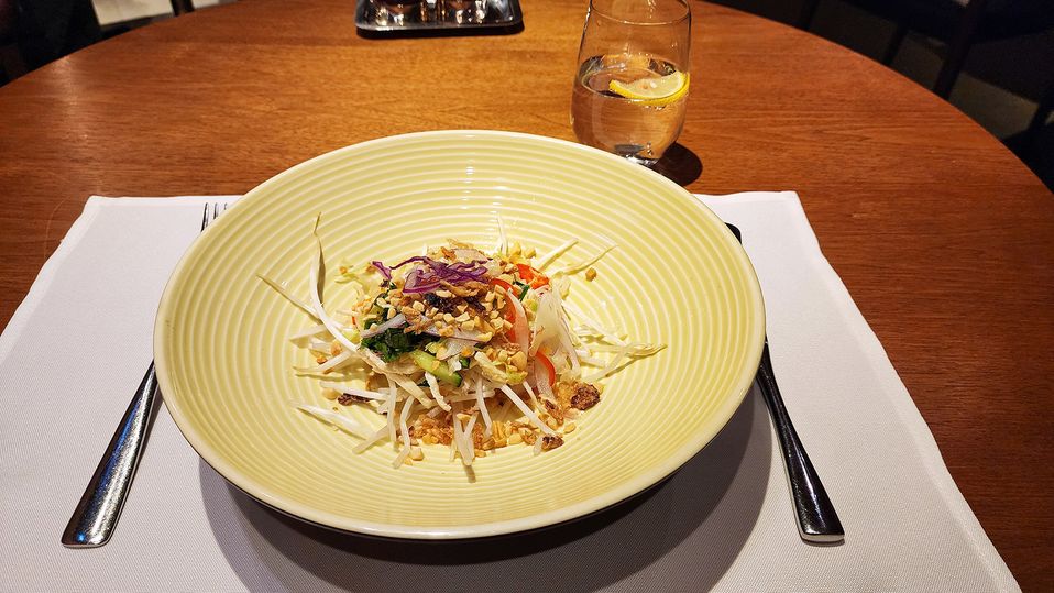 Vietnamese shredded chicken salad with fragrant greens.